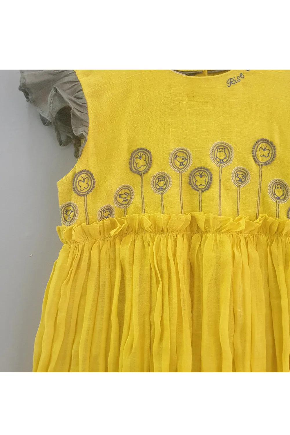 Yellow embroidered ruffled and layered dress