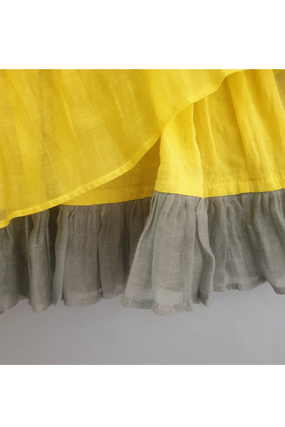 Yellow embroidered ruffled and layered dress